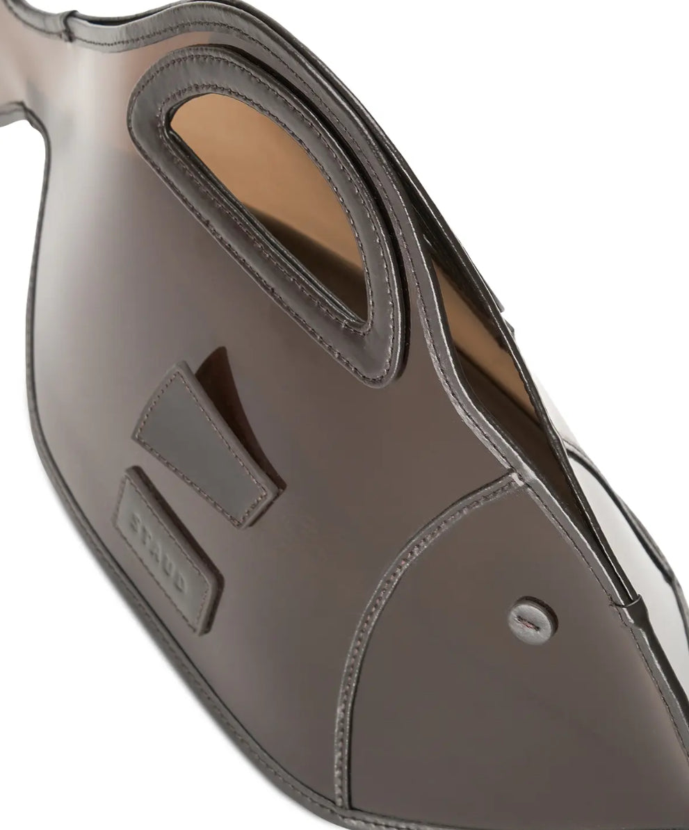 Close-up of a brown leather saddle pad on a white background