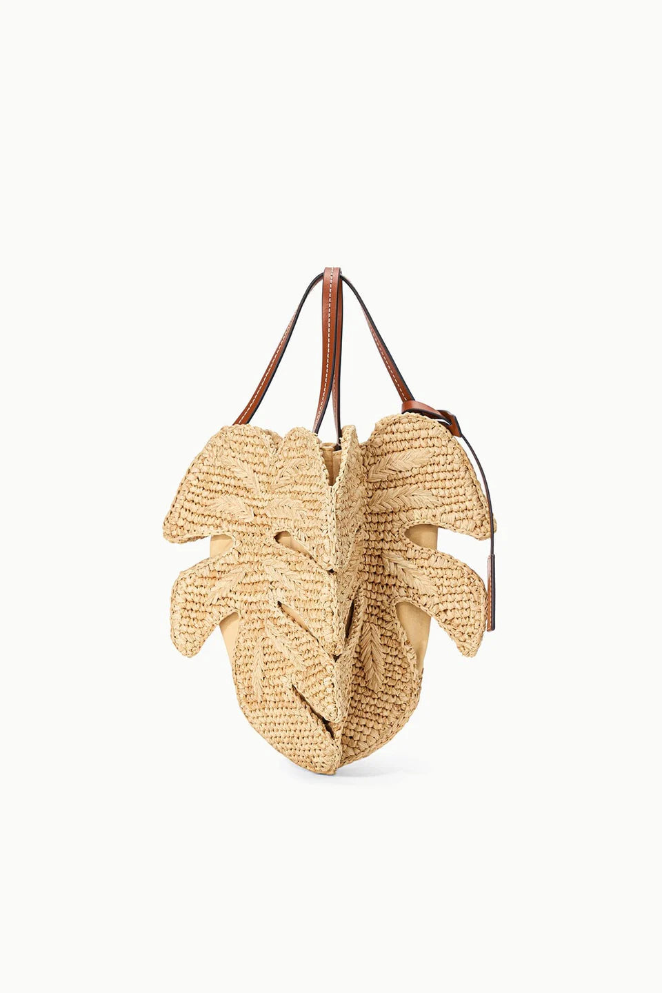 Woven handbag with leaf design on a white background