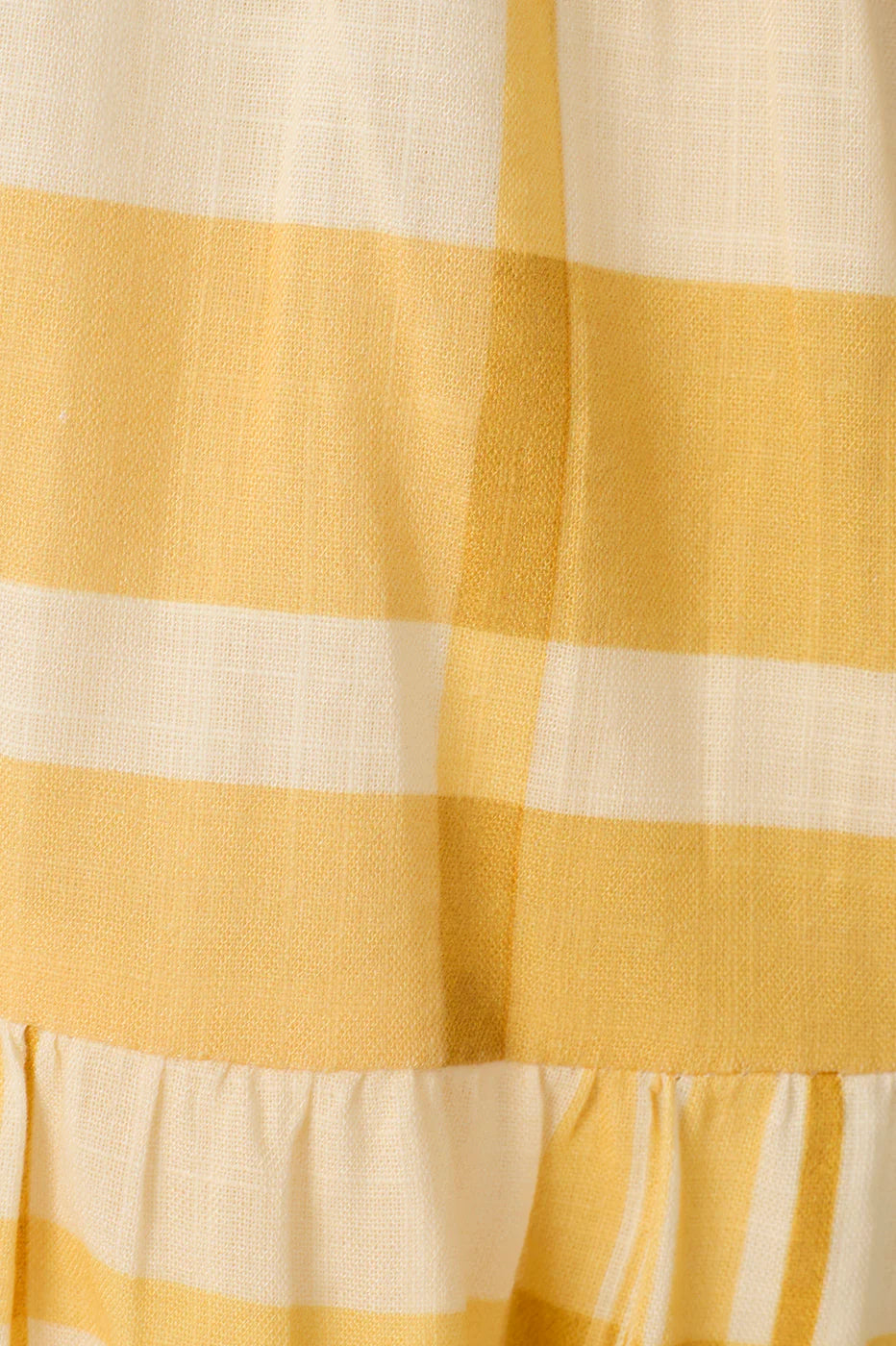 Close-up of a yellow and white striped fabric