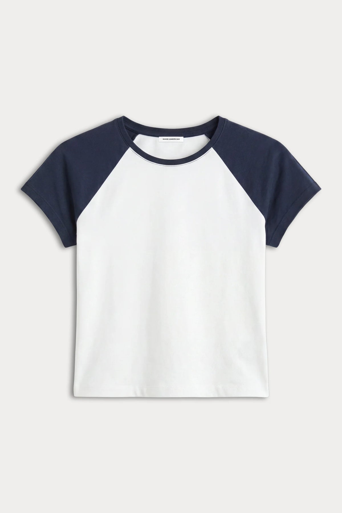 A short-sleeve raglan t-shirt with a white body and navy blue sleeves, displayed flat against a light gray background.