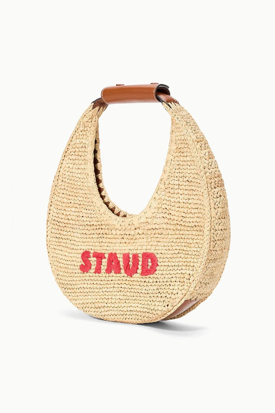 Woven handbag with 'STAUD' branding on a white background