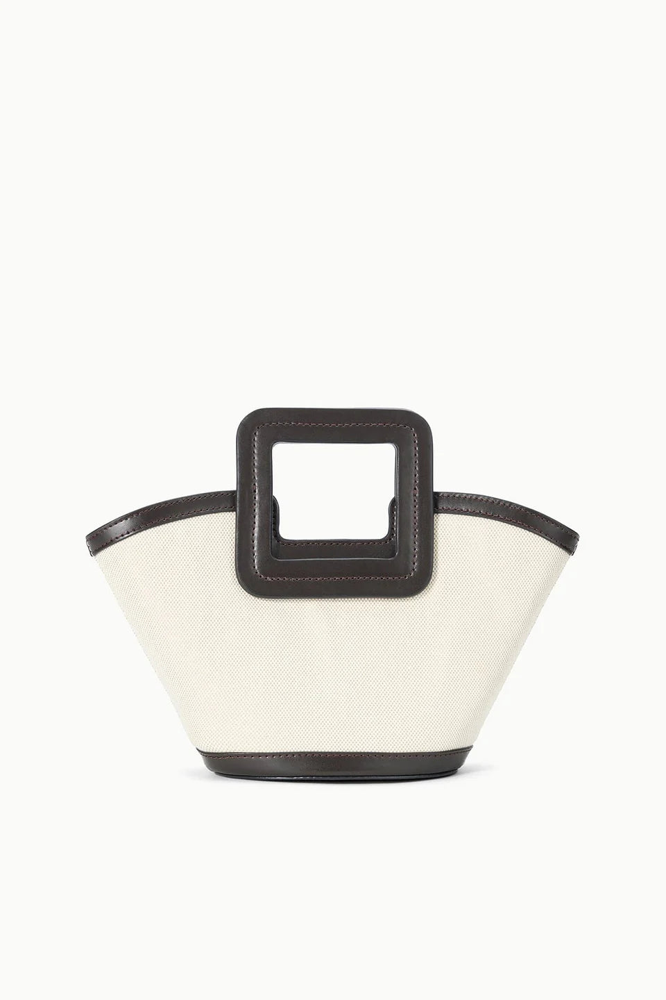 White handbag with black accents on a white background