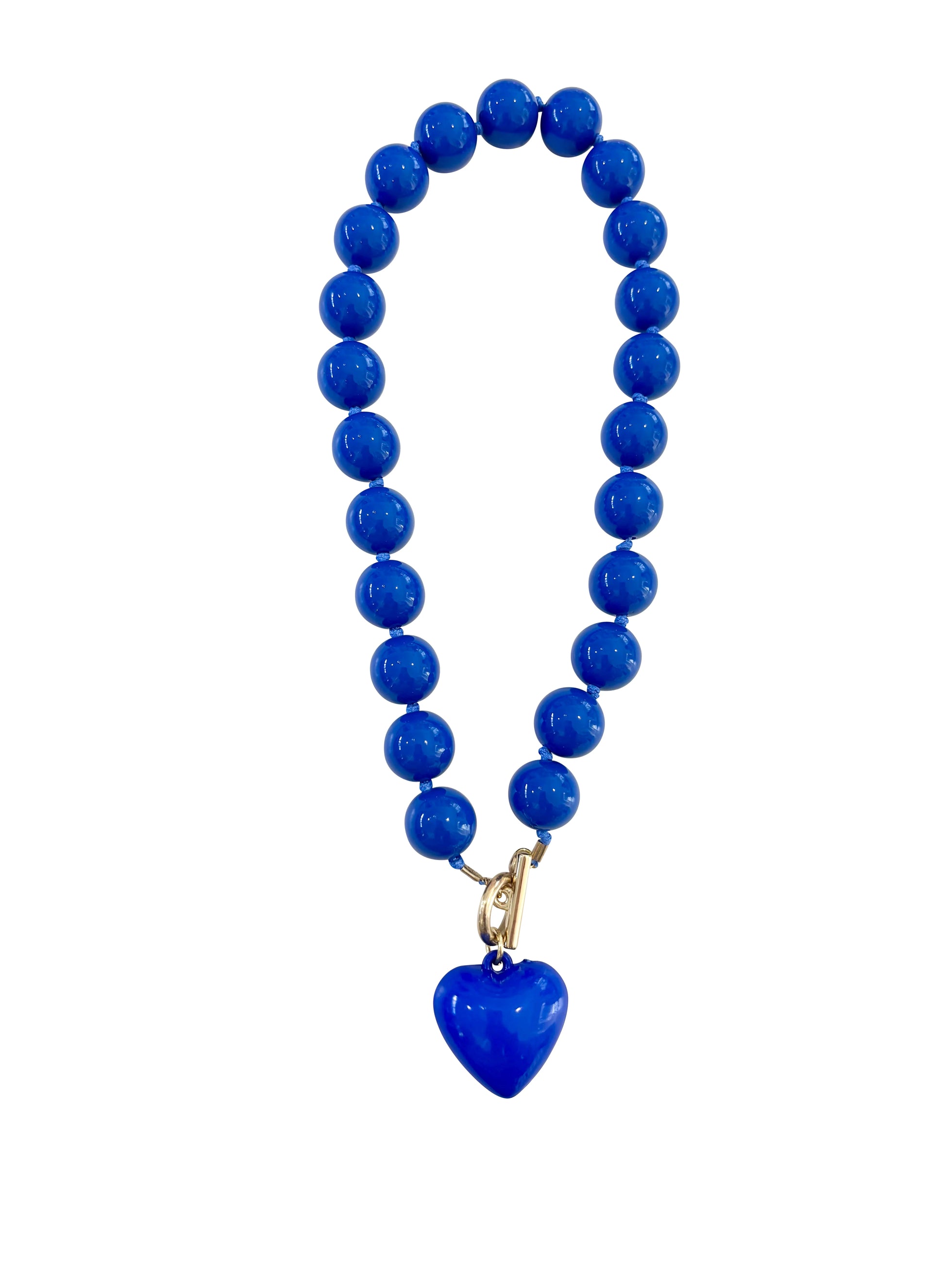 Blue beaded necklace with a heart-shaped pendant on a white background