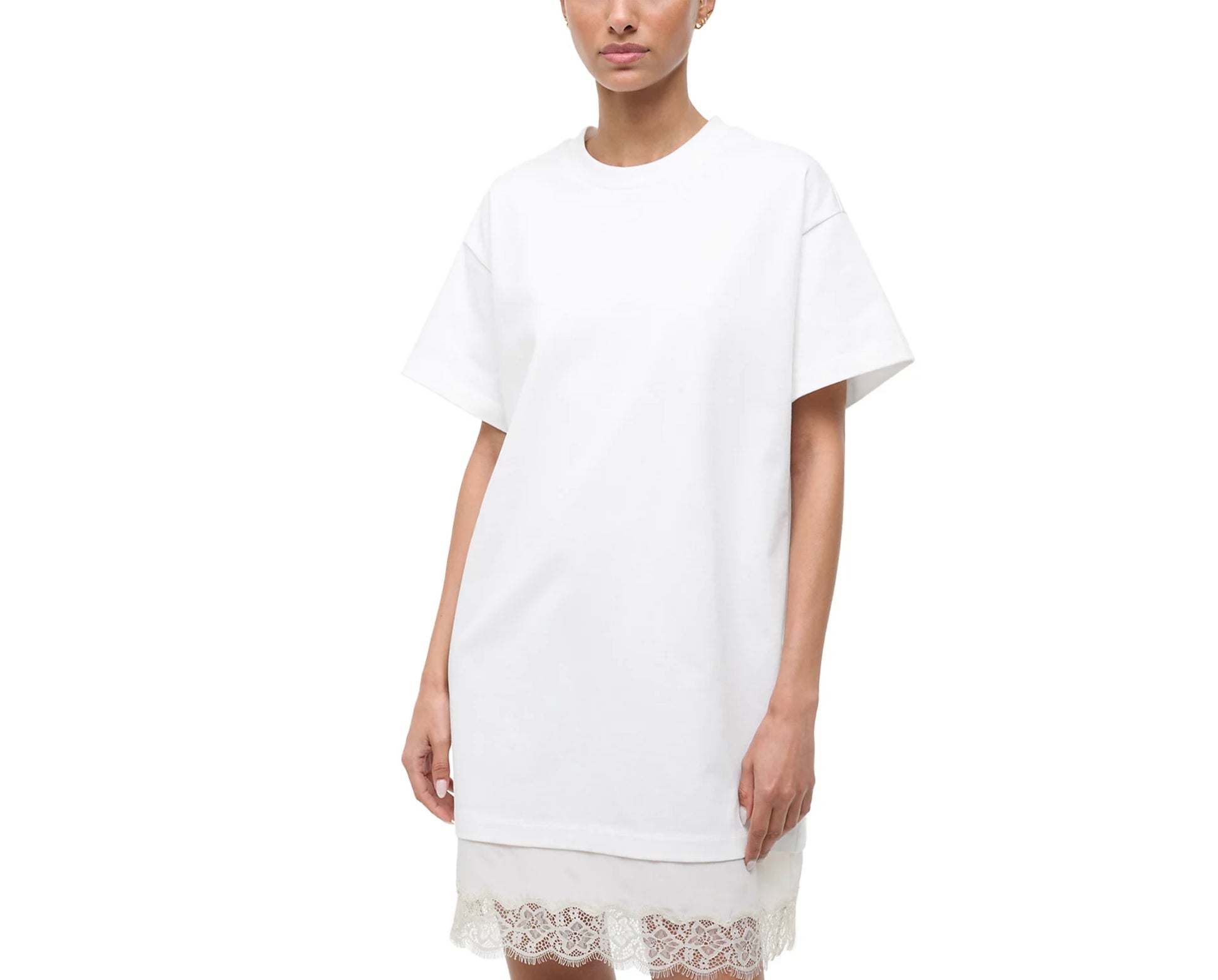 White t-shirt dress with lace trim worn by a model on a white background