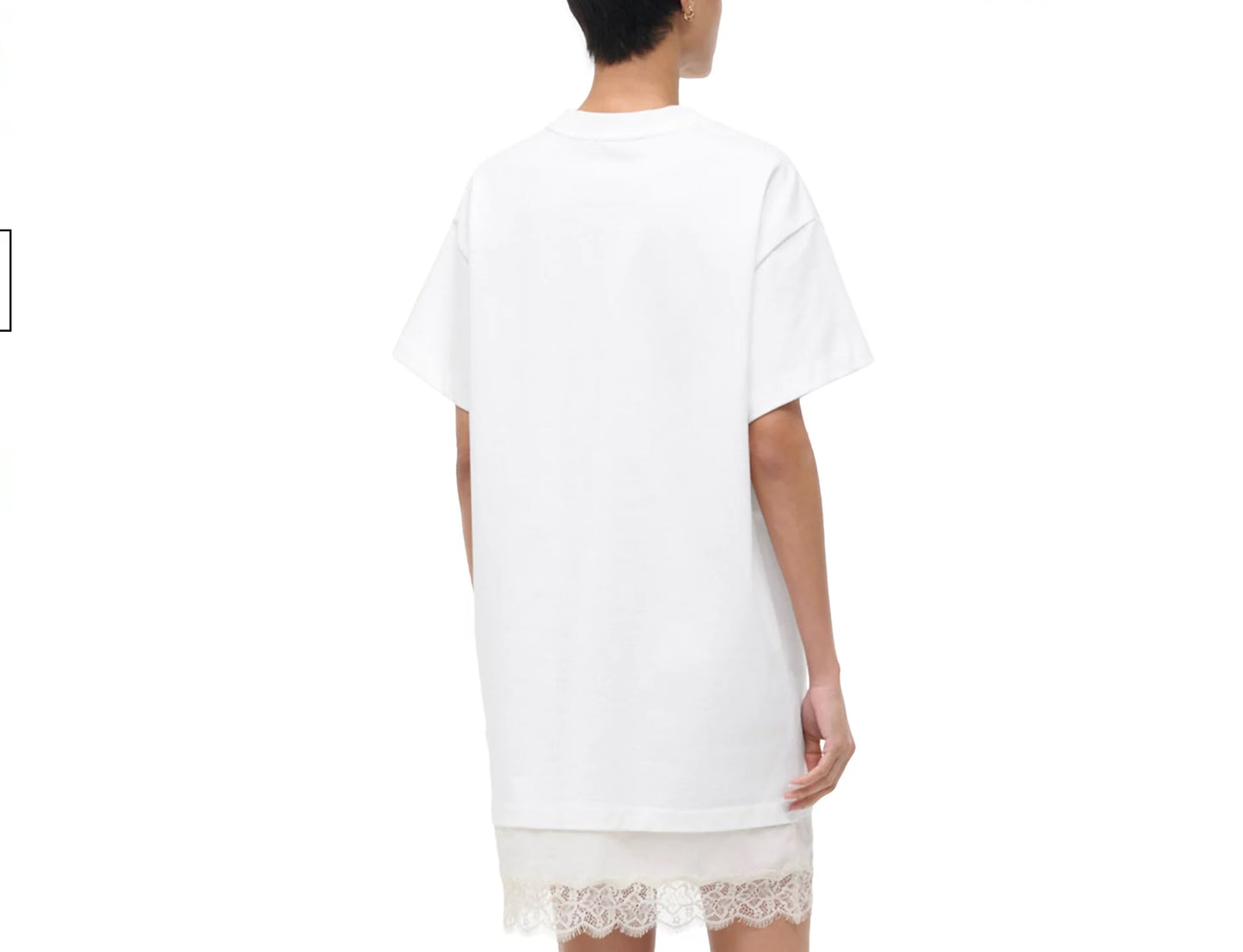 White dress with lace hem on a white background