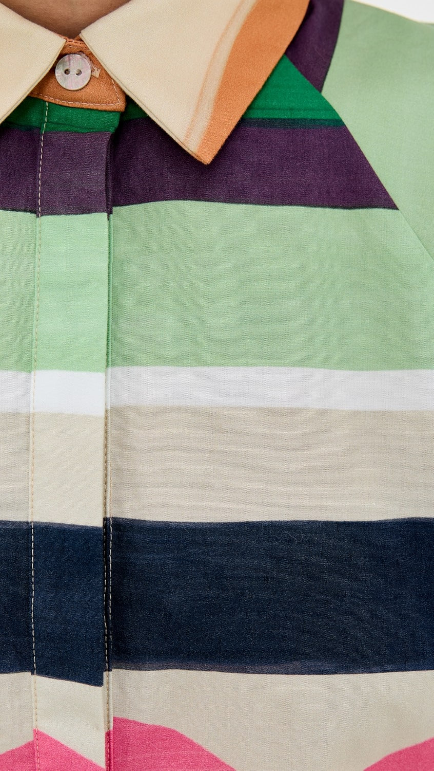 Close-up of a colorful striped shirt with a collar and button.