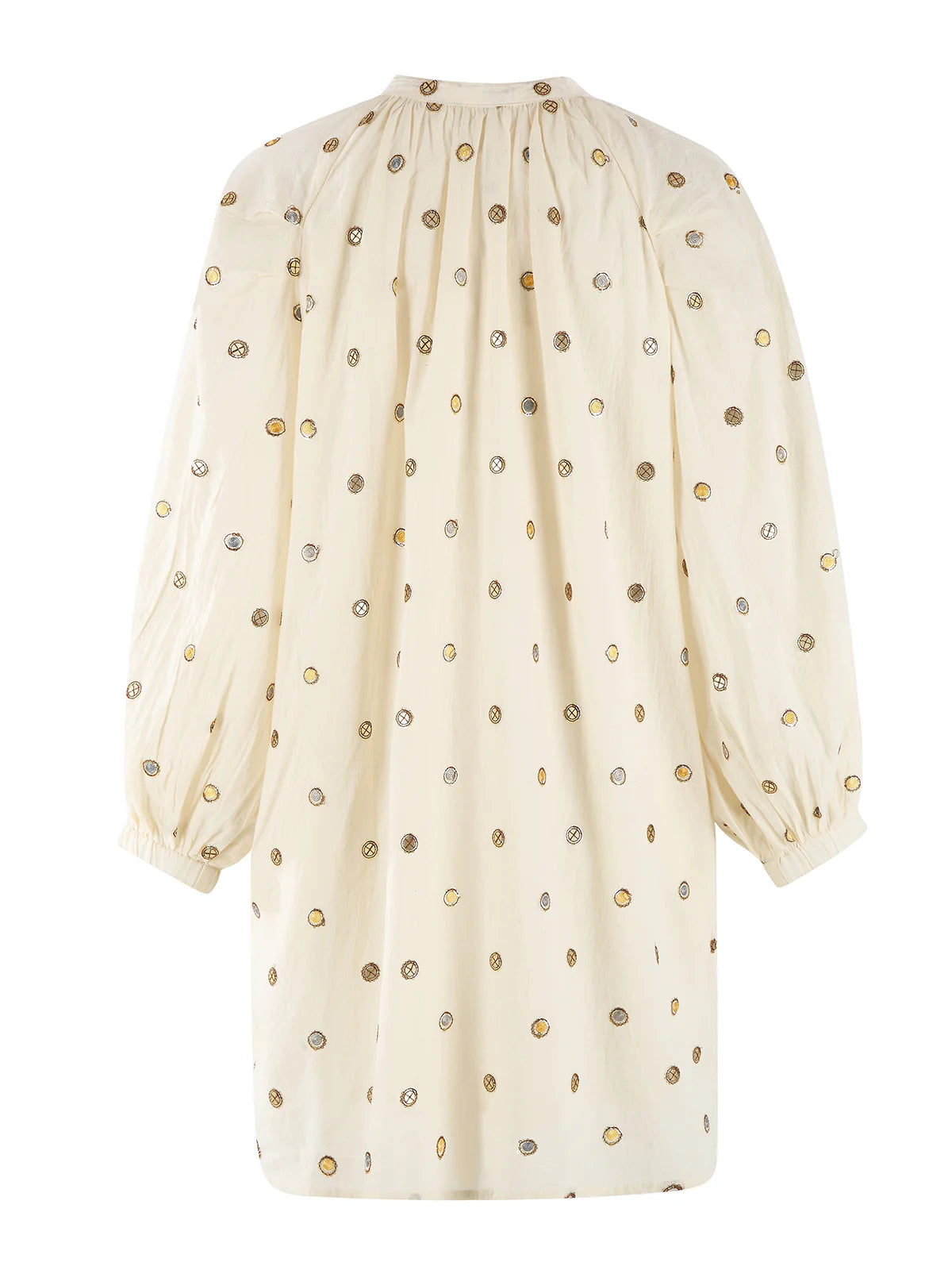 Cream-colored dress with gold polka dots on a white background