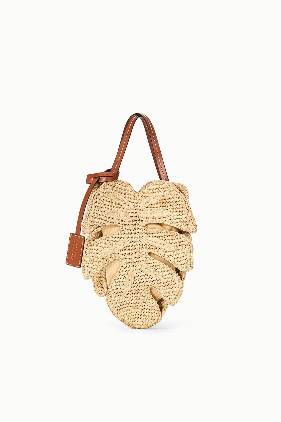 Beige woven handbag with brown leather strap on a white background