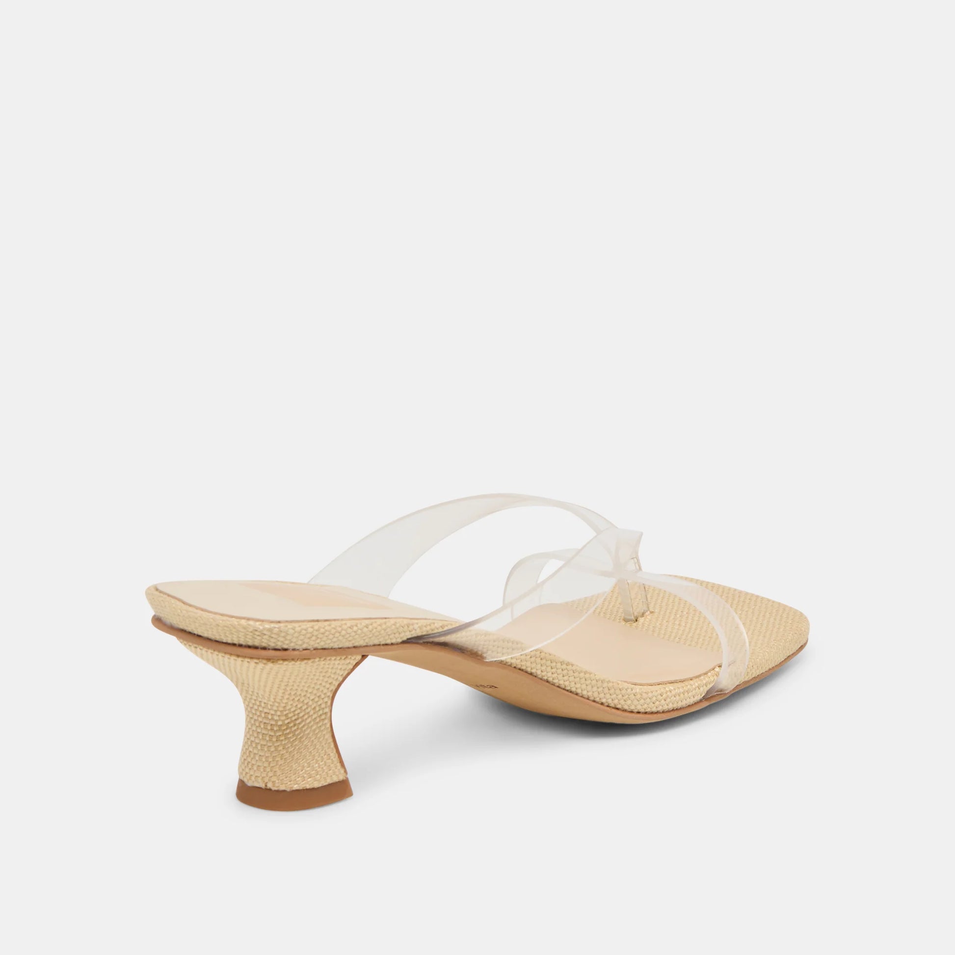 Beige sandal with clear strap on a white background