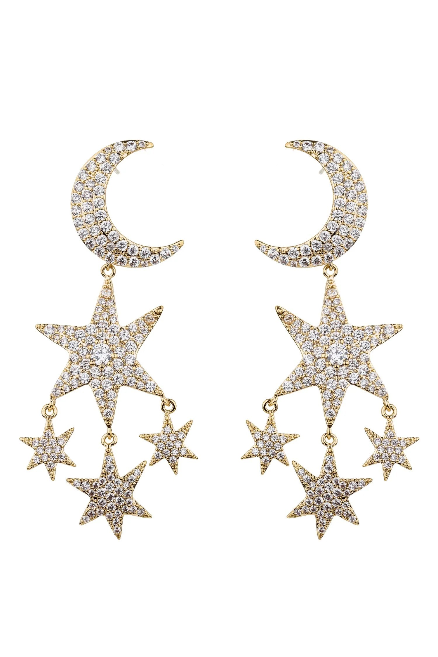 A pair of gold-toned dangle earrings featuring crescent moon and star motifs, heavily embellished with clear pavé stones, set against a plain white background.