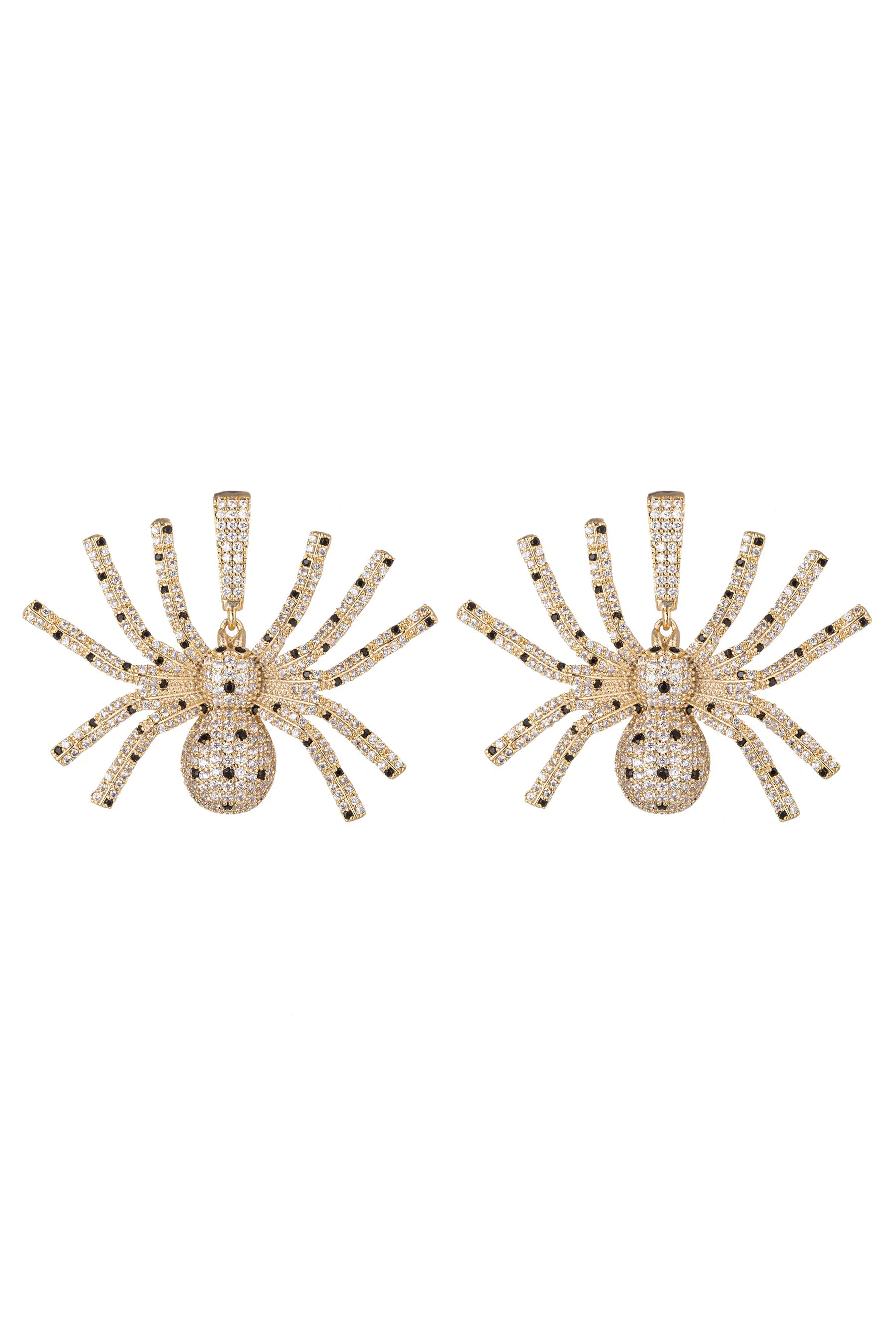 A pair of gold spider-shaped earrings paved with clear crystals, displayed side-by-side against a plain white background.