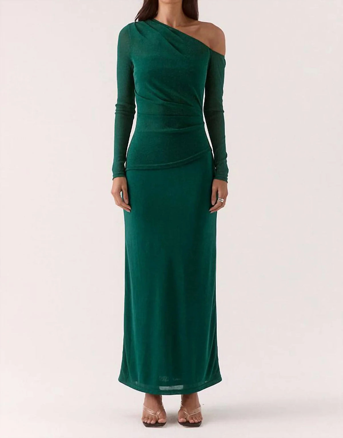Green one-shoulder maxi dress worn by a model on a white background