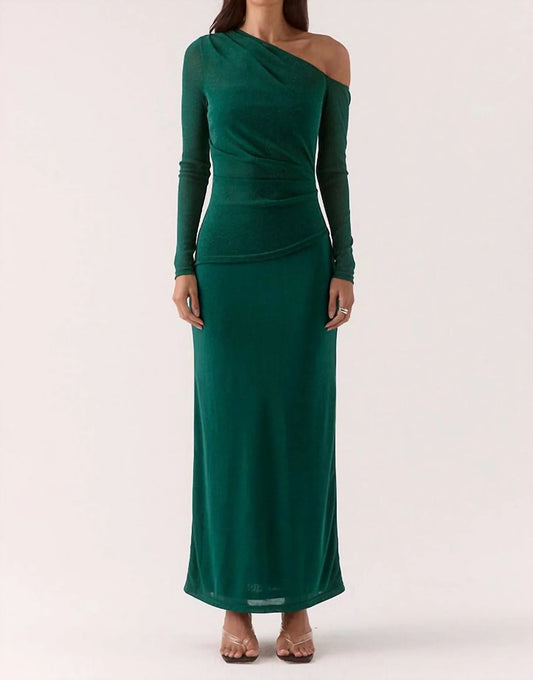 Green one-shoulder maxi dress worn by a model on a white background